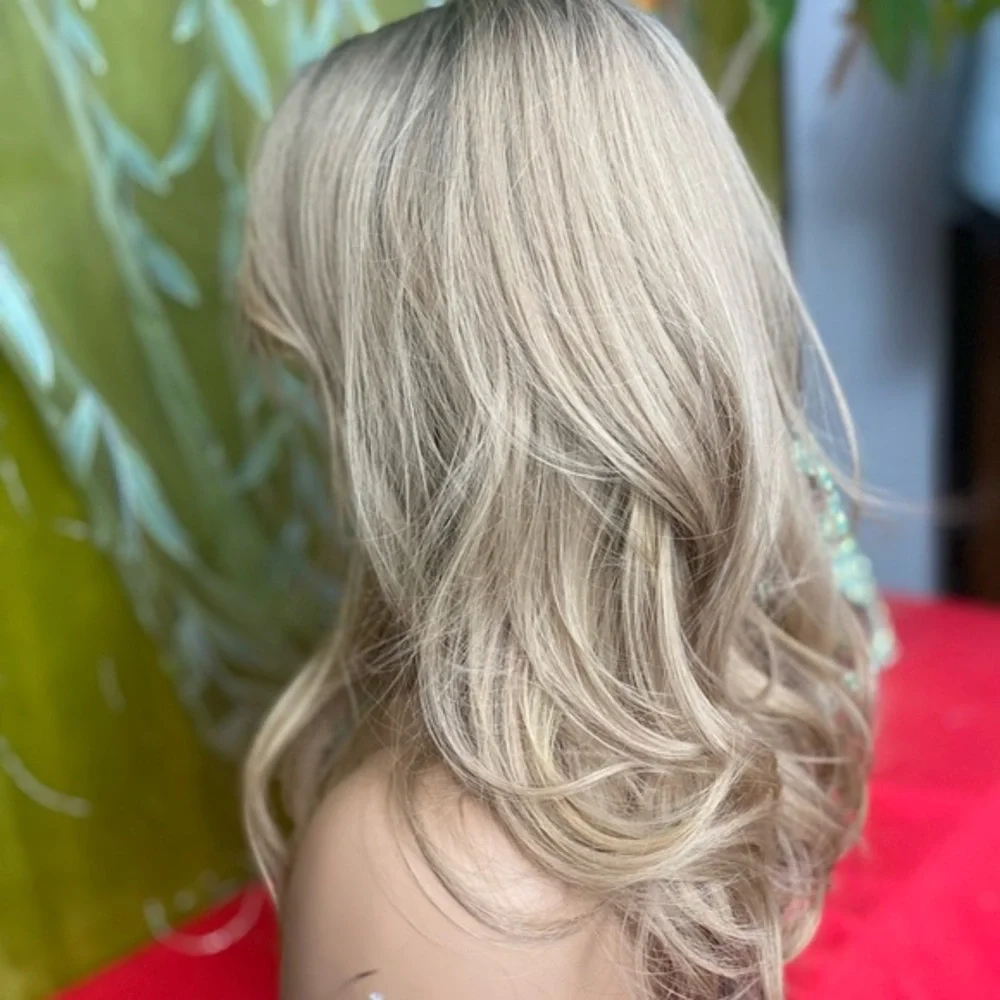 Golden dirty blonde layered wig with bangs and roots